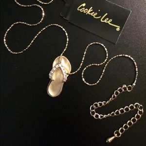 Gold tone sandal with genuine CZs